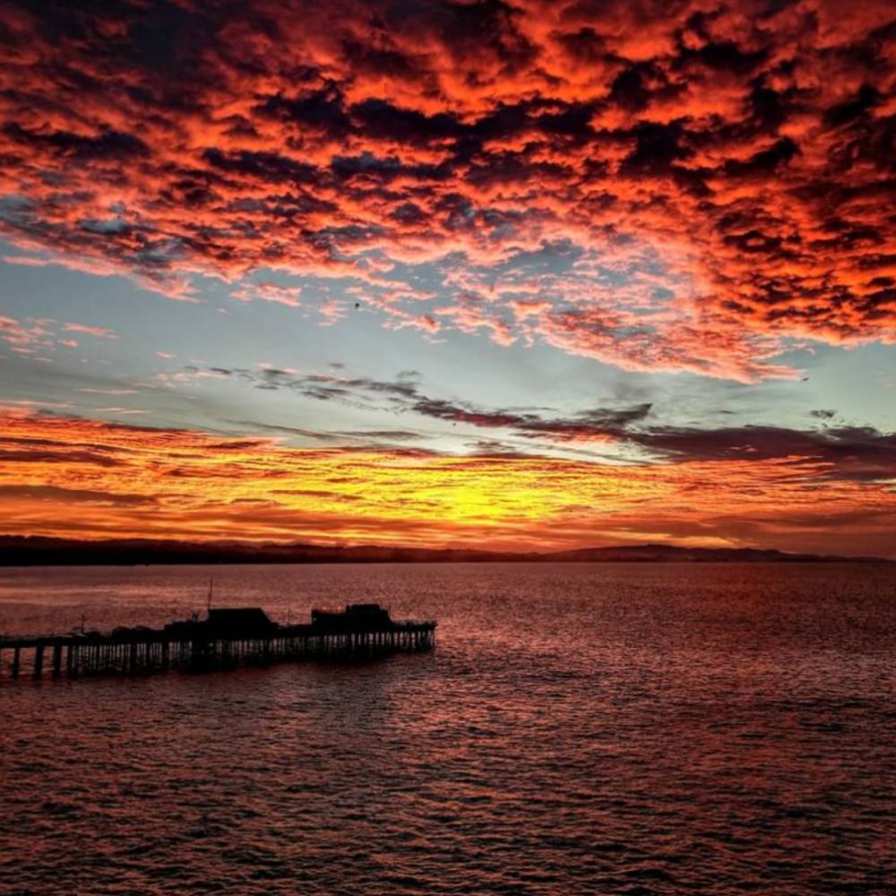 Yellow and red sky and dock